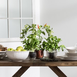 Wooden table with bread and tableware