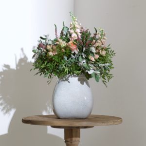 Large stone vase with flowers
