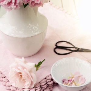 white ceramic jug with pink flowers