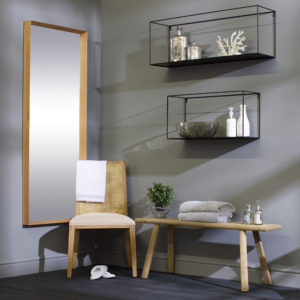 Open shelving with decorative coral and jugs