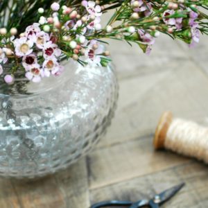 Vase of flowers and cotton thread