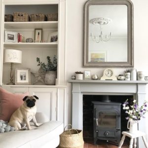 Living room with fireplace and neutral decor