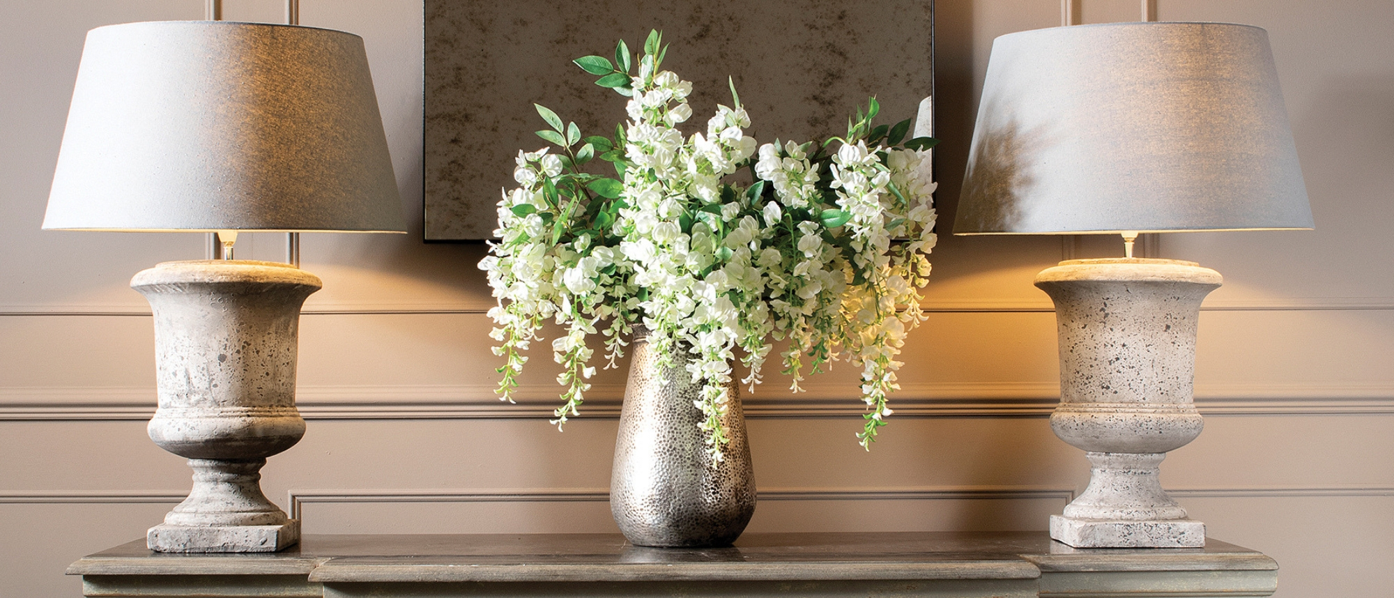 Vase of white and green flowers