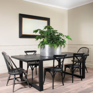 Large black dining table with planter centrepiece 