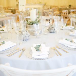 wedding breakfast table with glassware and foliage 