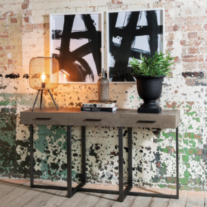 Industrial wall with wall art and side table